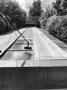 Cleaning a glass roof with professional equipment