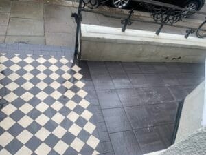 Patio after cleaning now clean with dirt removed